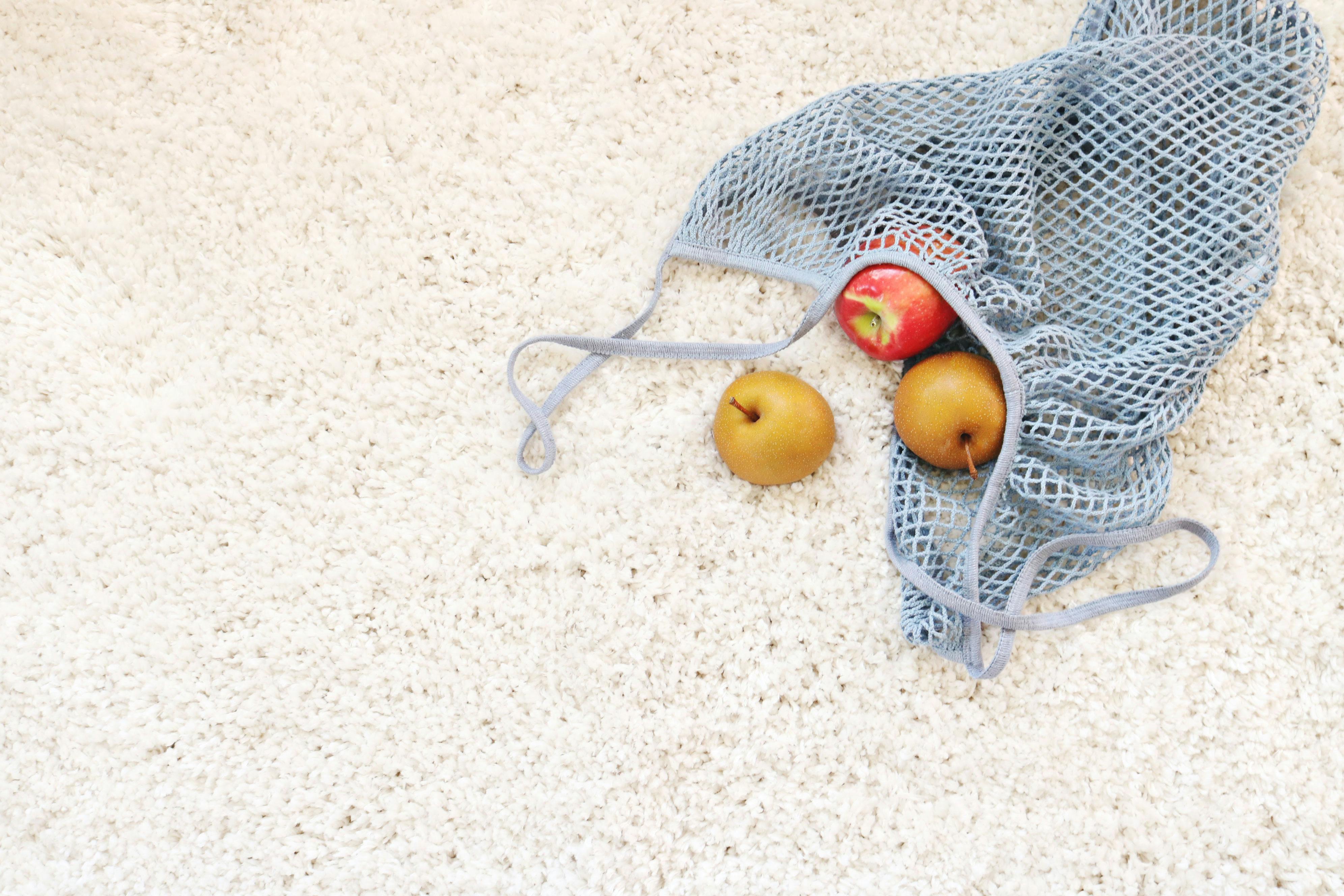 Natural cleaning supplies including baking soda and vinegar